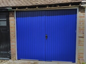 Steel side hinged garage doors manufactured by Cardale - After
