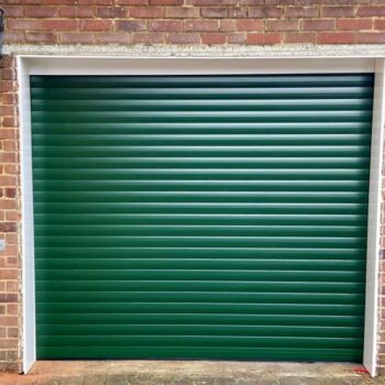 Alluguard 77 Rollershutter in Fir Green complete with radio remote controls and two hand transmitters