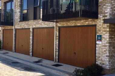 CDC-GRP-Garage-Door-Verwood-Style-in-Honey-Beech-with-anthracite-grey-frames-and-fully-automate