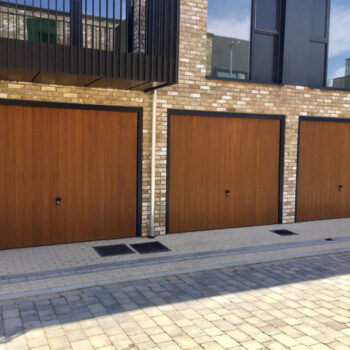 CDC GRP Garage Door Verwood Style in Honey Beech with anthracite grey frames and fully automated