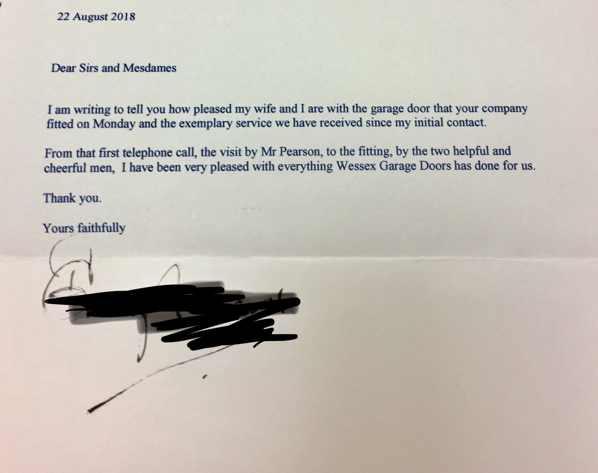 Customer letter advising they were pleased with Wessex Garage Doors service they received